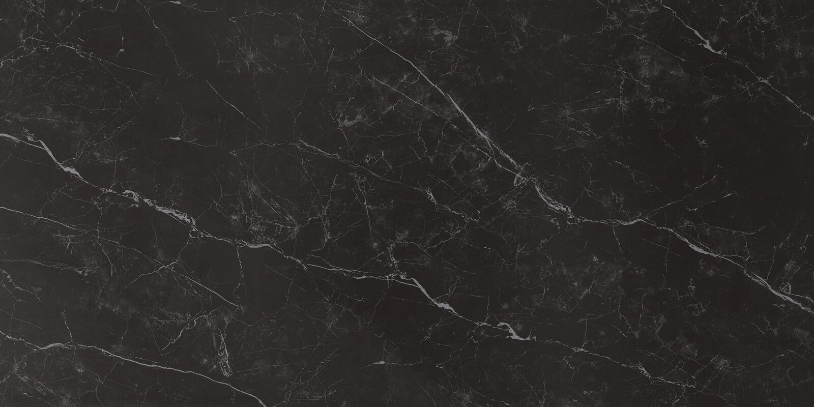 Panarea porcelain slab. Deep black with fine white veins on the diagonal. Full slab, 5 ft 3 in by 10 ft 6 in.
